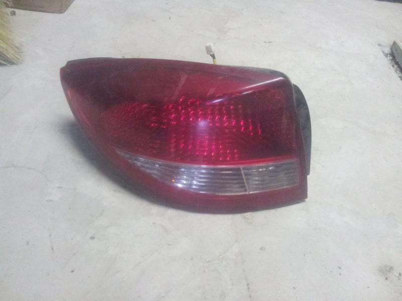 Фонарь задний левый 082231913L KIA RIO 02-05 Фонарь задний левый 082231913L KIA RIO 02-05
