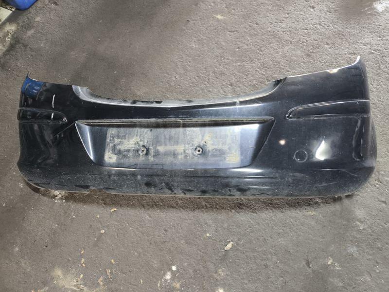 Бампер задний 1404557 OPEL CORSA D Бампер задний 1404557 OPEL CORSA D